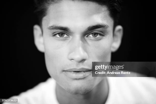 Model is seen backstage ahead of the Les Hommes show during Milan Men's Fashion Week Spring/Summer 2019 on June 16, 2018 in Milan, Italy.