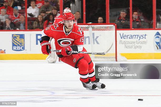 Tuomo Ruutu of the Carolina Hurricanes passes the puck during a NHL game against the Ottawa Senators on March 4, 2010 at RBC Center in Raleigh, North...