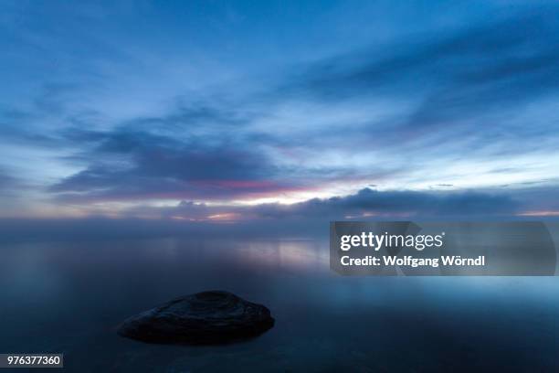 fishing cone sunrise - wolfgang wörndl stockfoto's en -beelden