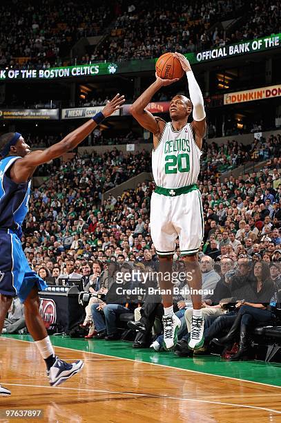 Ray Allen of the Boston Celtics shoots over Josh Howard of the Dallas Mavericks during the game on January 18, 2010 at TD Banknorth Garden in Boston,...