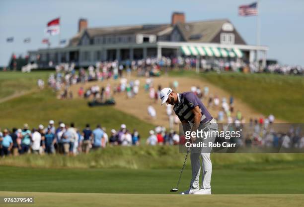 Dustin Johnson of the United States putts on the first green during the third round of the 2018 U.S. Open at Shinnecock Hills Golf Club on June 16,...