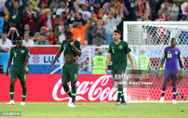 Oghenekaro Etebo, Odion Ighalo, Leon Balogun and Francis Uzoho stand dejected after conceding the opening goal during the 2018 FIFA World Cup Russia...