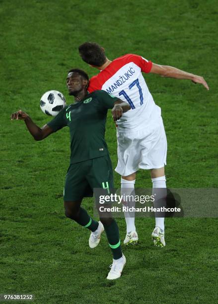 Onyinye Ndidi of Nigeria competes for a header with Mario Mandzukic of Croatia during the 2018 FIFA World Cup Russia group D match between Croatia...