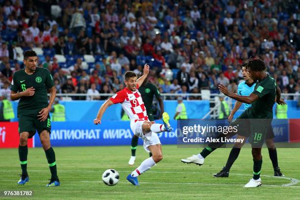 Alex Iwobi of Nigeria shoots past Andrej Kramaric of Croatia during the 2018 FIFA World Cup Russia group D match between Croatia and Nigeria at...