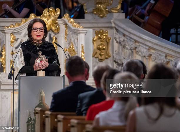 June 2018, Germany, Dresden: Award winner Nana Mouskouri, a singer from Greece, speaks at the award ceremony of the European Culture Prize 'Taurus'...