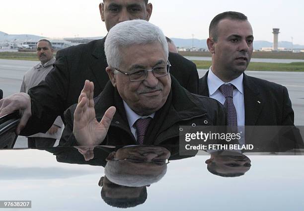 Palestinian President Mahmud Abbas waves as he arrives at Tunis Carthage International airport on March 11 Abbas is in Tunisia on a two-day official...