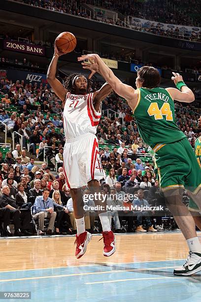 Jordan Hill of the Houston Rockets puts up a shot against Kyrylo Fesenko of the Utah Jazz during the game on February 27, 2010 at EnergySolutions...