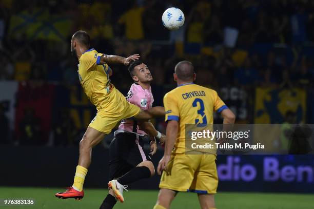 Ilija Nestorowski of Palermo is challenged by Federico Dionisi during the serie B playoff match final between Frosinone Calcio v US Citta di Palermo...