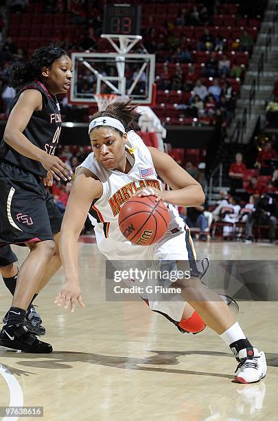 Kim Rodgers of the Maryland Terrapins handles the ball against the Florida State Seminoles at the Comcast Center on February 28, 2010 in College...