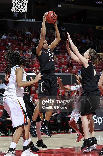 Chasity Clayton of the Florida State Seminoles grabs a rebound against the Maryland Terrapins at the Comcast Center on February 28, 2010 in College...