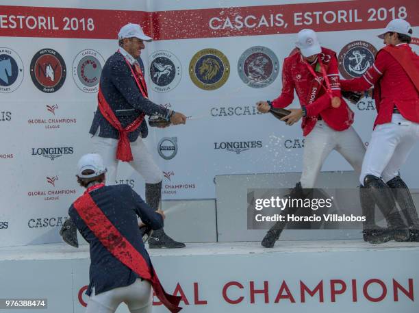 Gregory Wathelet and Darragh Kenny of winning team Paris Panthers spray champagne in jubilation at the end of "CSI 5" GCL of Cascais Estoril Round 2...