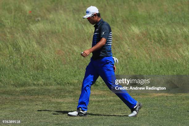 Hideki Matsuyama of Japan walks on the 14th green during the third round of the 2018 U.S. Open at Shinnecock Hills Golf Club on June 16, 2018 in...