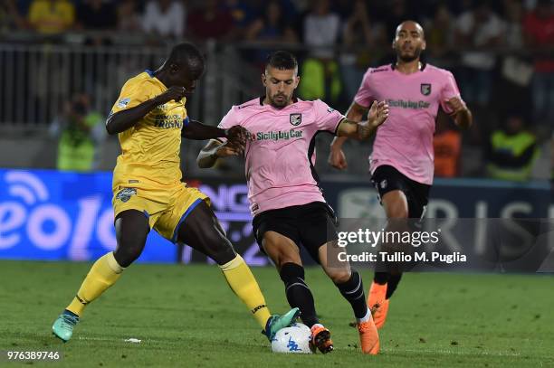 Moussa Saib Kone' of Frosinone and Aleksandar Trajkovski of Palermo compete for the ball during the serie B playoff match final between Frosinone...