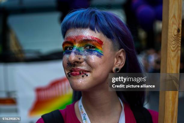 June 2018, Athens, Greece: A participant of the Gay Parade has painted her face in rainbow colours. Thousands partook in the Gay Pride Parade 2018 in...
