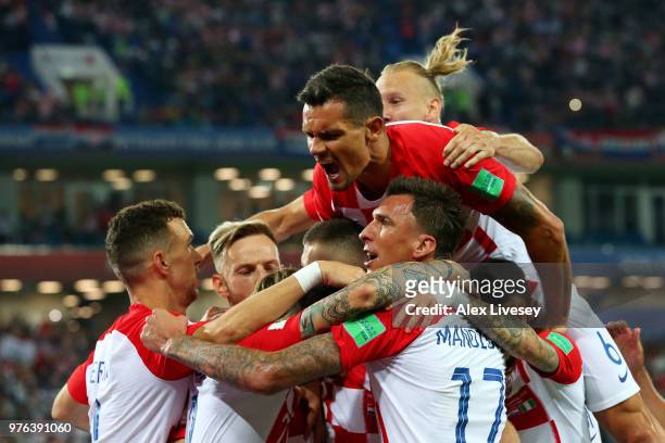 Luka Modric of Croatia celebrates with teammates after scoring his team's second goal during the 2018 FIFA World Cup Russia group match between...