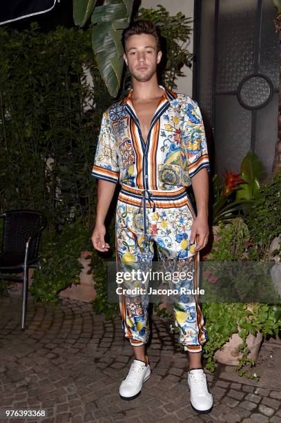 Cameron Dallas attends Dolce & Gabbana Naked King secret show at Milan Men's Fashion Week Spring/Summer 2019 on June 16, 2018 in Milan, Italy.