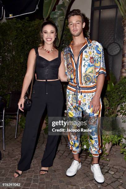 Sierra Dallas and Cameron Dallas attend Dolce & Gabbana Naked King secret show at Milan Men's Fashion Week Spring/Summer 2019 on June 16, 2018 in...