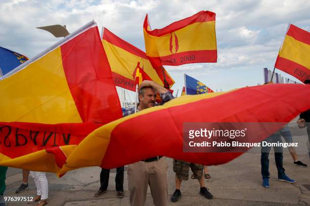 Far-right wing protester holding Spanish flags demonstrate against the arrival of migrants in Aquarius ship at the port of Valencia on June 16, 2018...