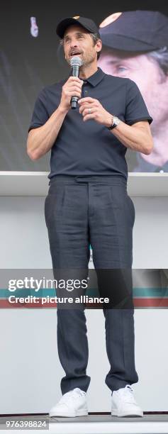 June 2018 Stuttgart, Germany: US actor Patrick Dempsey speaks during the "Sportscar Together Day" by Porsche. The 8th of June 1948 is the birthday of...