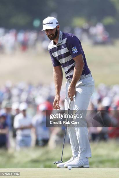 Dustin Johnson of the United States reacts to a missed putt for par on the fourth green during the third round of the 2018 U.S. Open at Shinnecock...