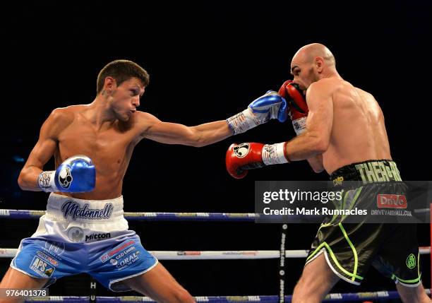 Gavin McDonnell , takes on Stuart Hall black shorts), during the WBC International Super-Bantamweight Championship contest presented by Matchroom...