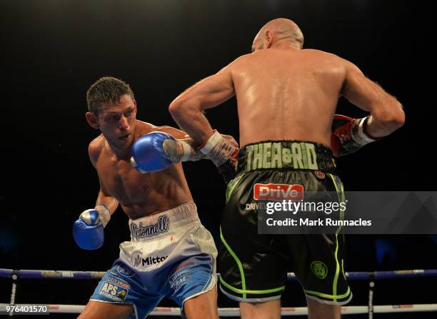 Gavin McDonnell , takes on Stuart Hall black shorts), during the WBC International Super-Bantamweight Championship contest presented by Matchroom...