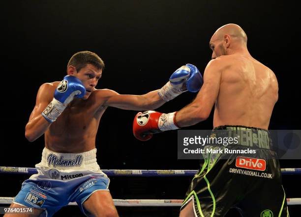 Gavin McDonnell , takes on Stuart Hall black shorts), during the WBC International Super-Bantamweight Championship contest presented by Matchroom...