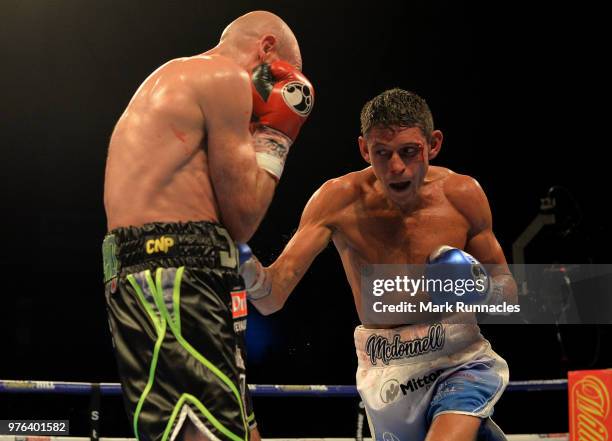 Gavin McDonnell , takes on Stuart Hall black shorts), during the WBC International Super-Bantamweight Championship contest presented by Matchroom...