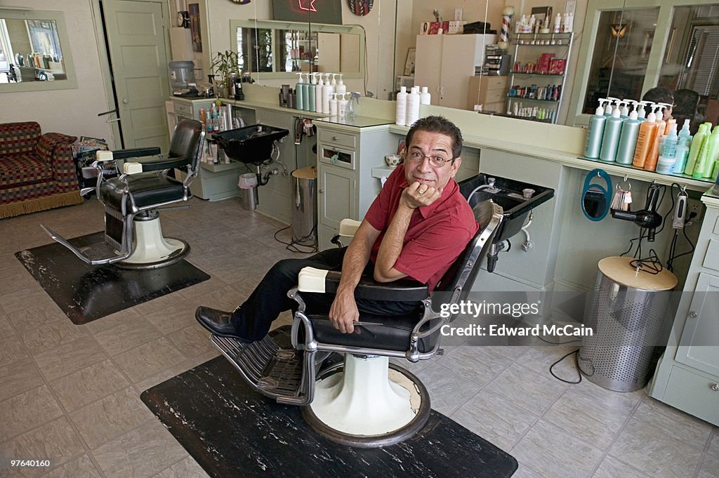 Barber relaxing in chair