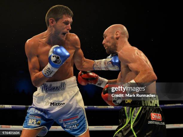 Gavin McDonnell , takes on Stuart Hall black shorts), during the WBC International Super-Bantamweight Championship contest presented by Matchroom...