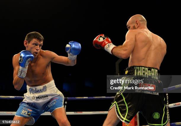 Gavin McDonnell , takes on Stuart Hall black shorts), during the WBC International Super-Bantamweight Championship contest presented by Matchroom...