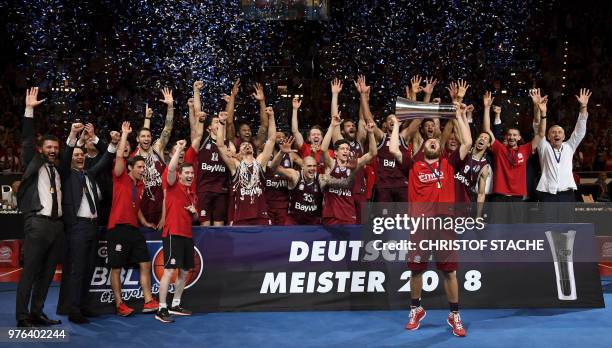 The FC Bayern Munich Basketball team celebrates winning the German Basketball Championship at the Audi Dome in Munich, southern Germany, on June 16,...