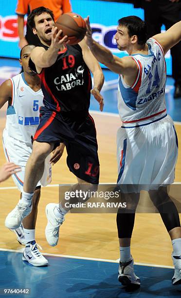 Caja Laboral's Fernando San Emeterio vies with Cibona Zagreb's Dalibor Bagaric during a Euroleague basketball match on March 11 at Fernando Buesa...