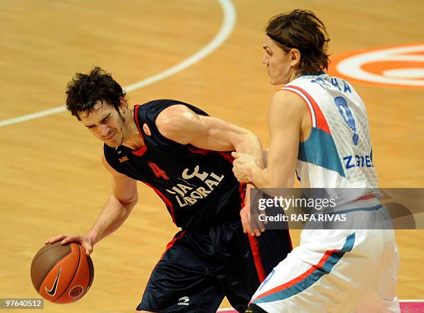 Caja Laboral's Pau Ribas vies with Cibona Zagreb's Robert Troha during a Euroleague basketball match on March 11 at Fernando Buesa Arena in Vitoria....