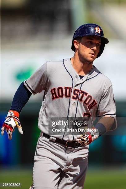 Alex Bregman of the Houston Astros runs the bases after hitting a three run home run against the Kansas City Royals during the ninth inning at...