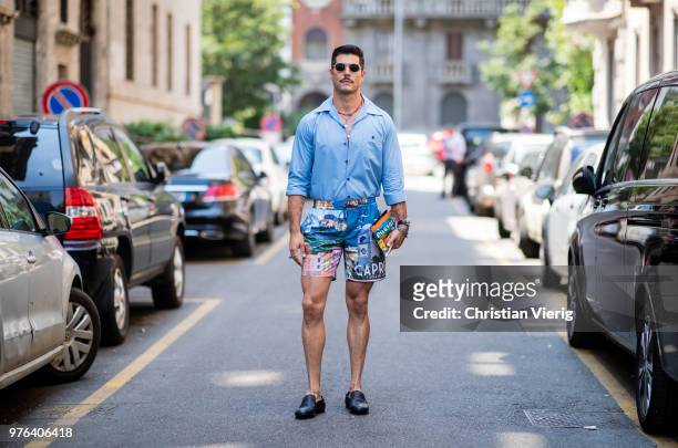 Kadu Dantas wearing shirts, blue button shirt is seen outside Dolce & Gabbana during Milan Men's Fashion Week Spring/Summer 2019 on June 16, 2018 in...