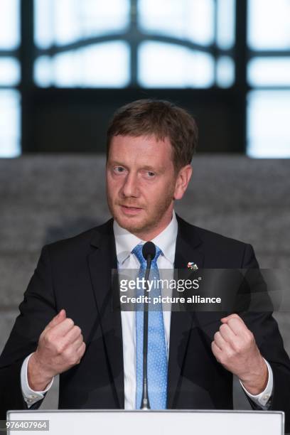June 2018, Germany, Dresden: Michael Kretschmer of the Christian Democratic Union , Premier of Saxony, delivers a speech on the occassion of the...