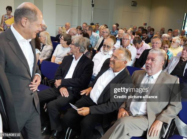 June 2018, Germany, Berlin: Olaf Scholz of the Social Democratic Party , German Minister of Finance, meets Hans Eichel , former German Minister of...