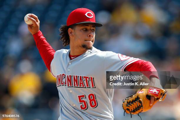 Luis Castillo of the Cincinnati Reds pitches in the first inning against the Pittsburgh Pirates at PNC Park on June 16, 2018 in Pittsburgh,...
