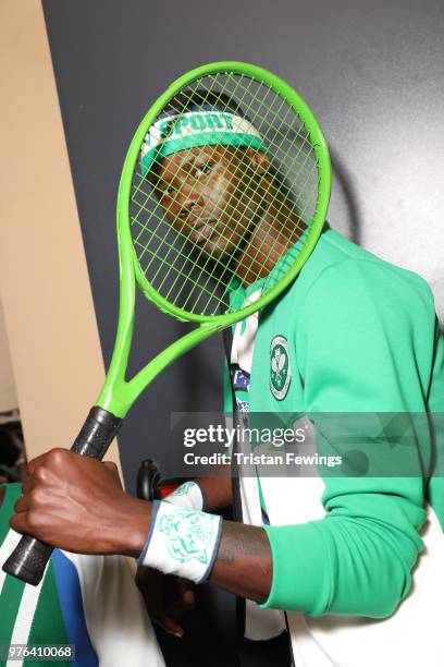 Model is seen backstage ahead of the Plein Sport show during Milan Men's Fashion Week Spring/Summer 2019 on June 16, 2018 in Milan, Italy.