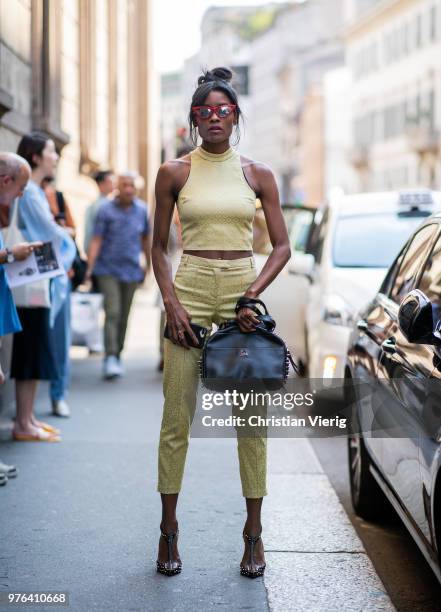 Guest wearing cropped pants is seen outside Les Hommes during Milan Men's Fashion Week Spring/Summer 2019 on June 16, 2018 in Milan, Italy.