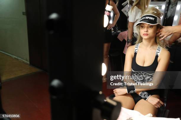 Model has prepared backstage ahead of the Plein Sport show during Milan Men's Fashion Week Spring/Summer 2019 on June 16, 2018 in Milan, Italy.