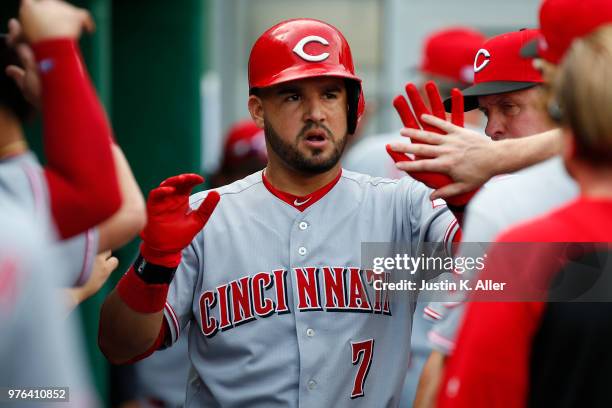 Eugenio Suarez of the Cincinnati Reds celebrates after hitting a solo home run in the second inning against the Pittsburgh Pirates at PNC Park on...