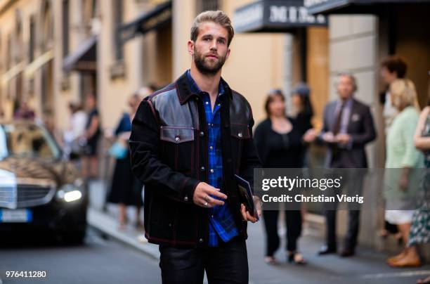 Andre Hamann wearing leather denim jacket is seen outside Versace during Milan Men's Fashion Week Spring/Summer 2019 on June 16, 2018 in Milan, Italy.