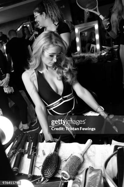 Paris Hilton is seen backstage ahead of the Plein Sport show during Milan Men's Fashion Week Spring/Summer 2019 on June 16, 2018 in Milan, Italy.