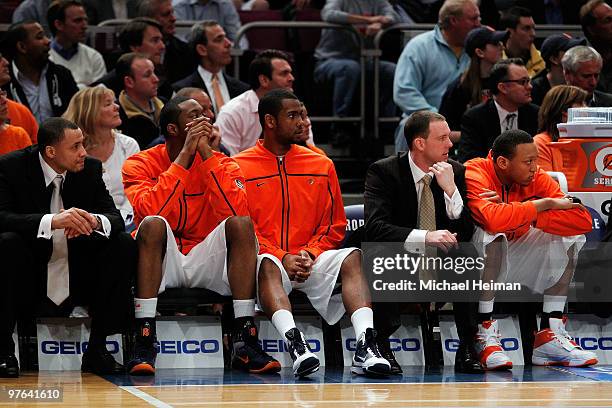 The Syracuse Orange bench looks on late in the game against the Georgetown Hoyas during the quarterfinal of the 2010 NCAA Big East Tournament at...