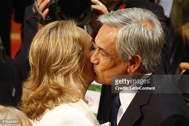 Chile's new President Sebastian Pinera kisses his wife Cecilia Morel during the inauguration ceremony at the Congress on March 11, 2010 in...