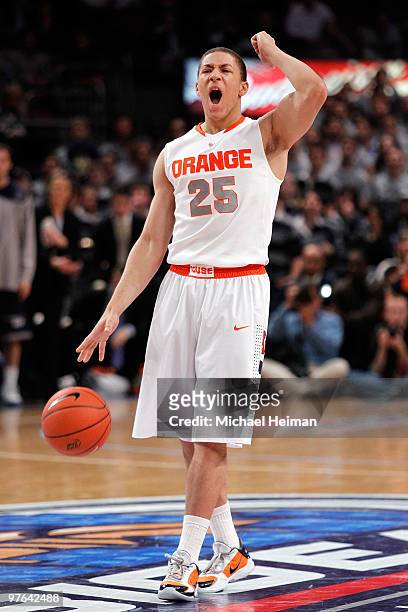 Brandon Triche of the Syracuse Orange handles the ball against the Georgetown Hoyas during the quarterfinal of the 2010 NCAA Big East Tournament at...