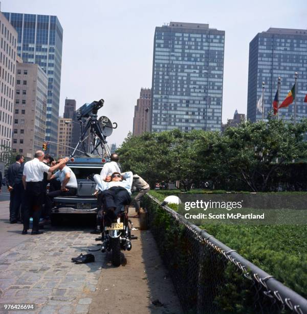 New York City - An NBC television crew takes a break from filming near the United Nations on the east side of Manhattan.