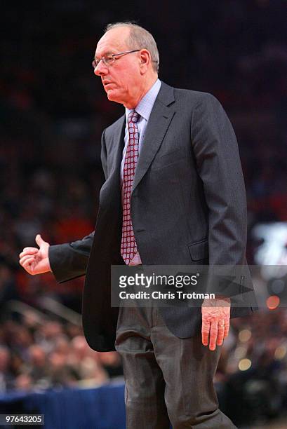 Head coach Jim Boeheim of the Syracuse Orange walks off the court after losing to the Georgetown Hoyas during the quarterfinal of the 2010 NCAA Big...